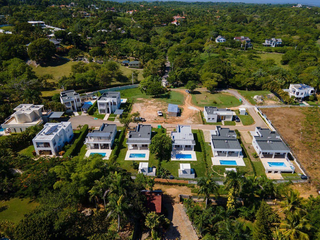 buyDRproperty Aerial view of a 3-Bedroom Oasis villa with a private pool in Sosua Sosua Real Estate
