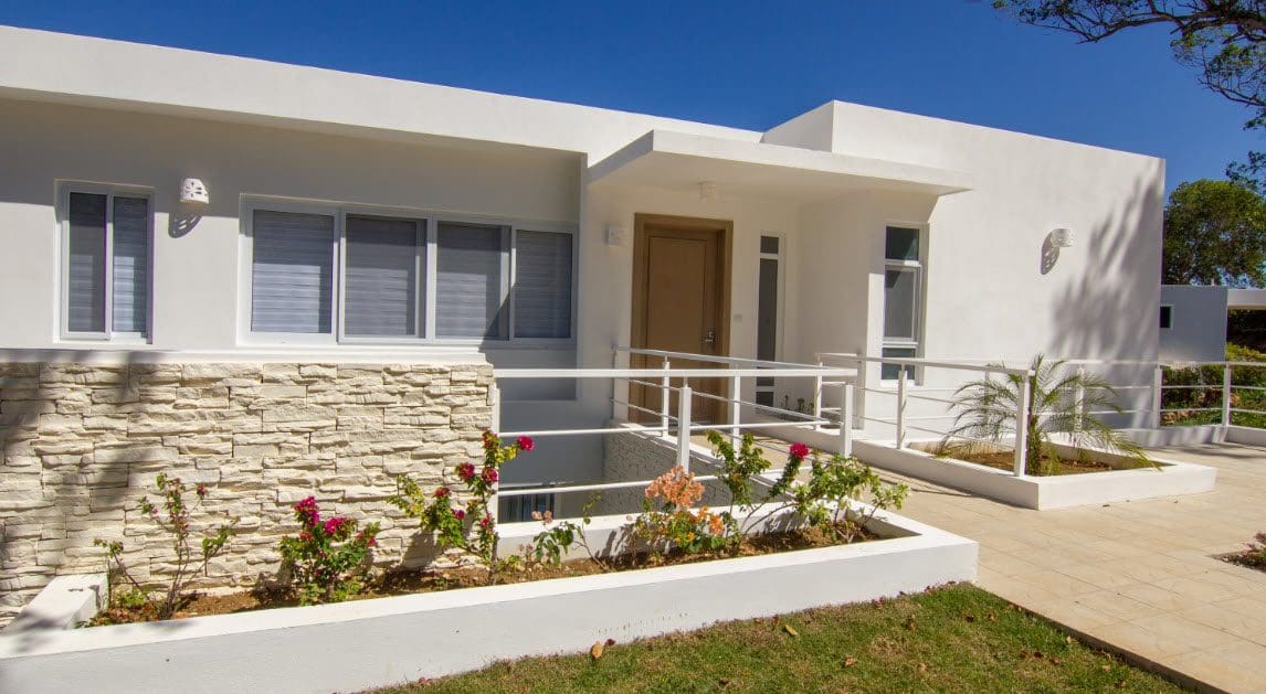 buyDRproperty Beautiful Villa SEASHELL in Casa Linda with a ramp and stone facade. Sosua Real Estate