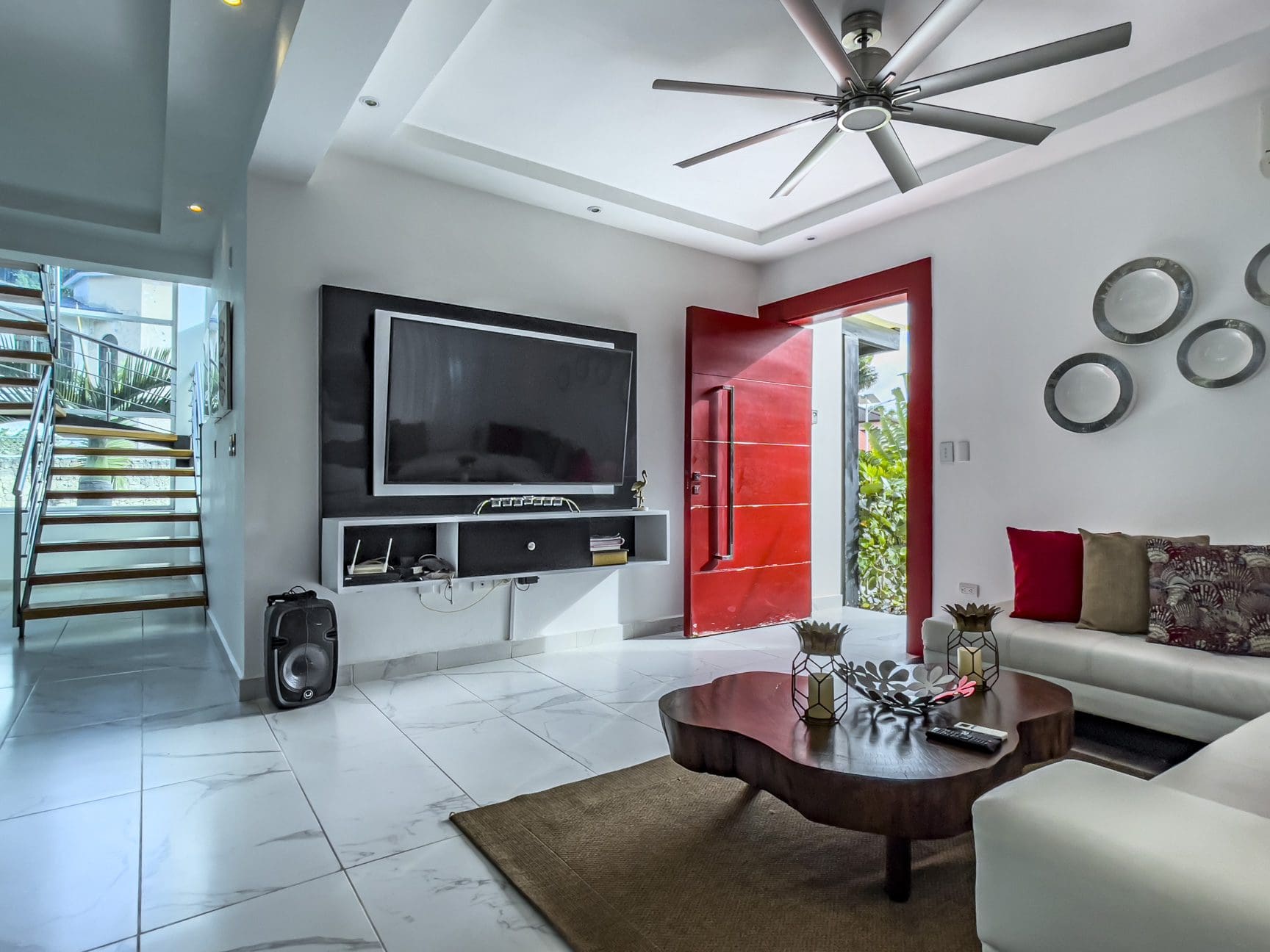 Bright open-concept living room in Sosua Ocean Village villa".