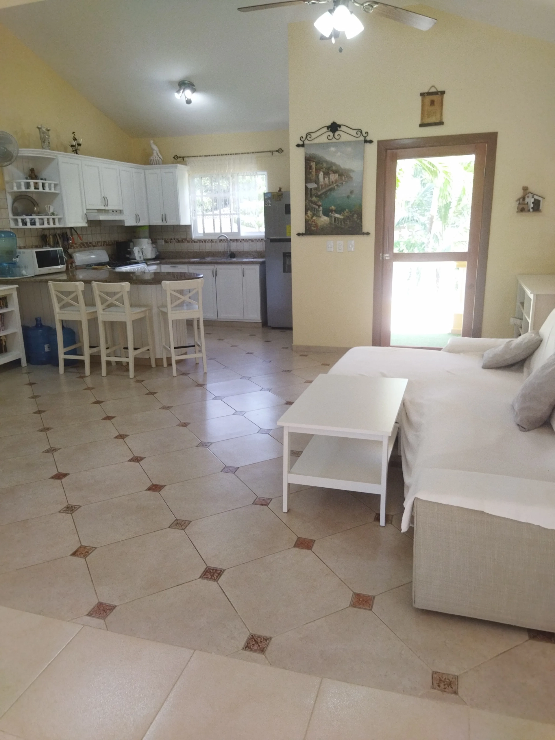 buyDRproperty Charming villa interior with kitchen and living room Sosua Real Estate