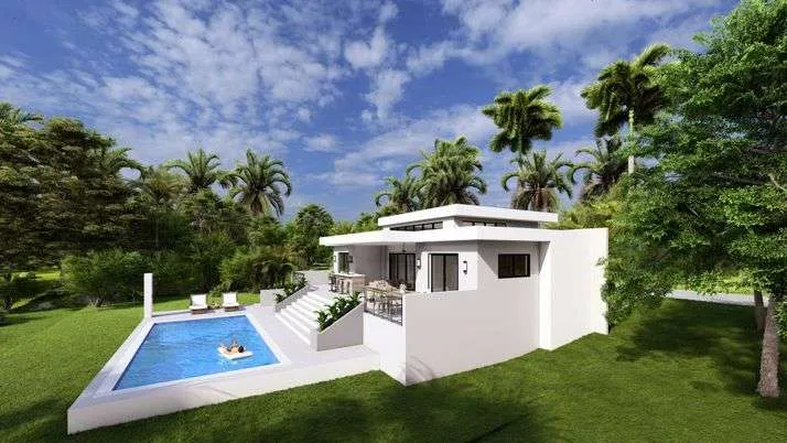 buyDRproperty Modern white house with swimming pool surrounded by lush tropical trees. Sosua Real Estate