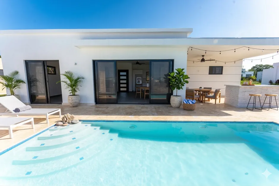 Buydrproperty Modern White Villa with a Private Pool Outdoor Dining and Bar Sosua Real Estate