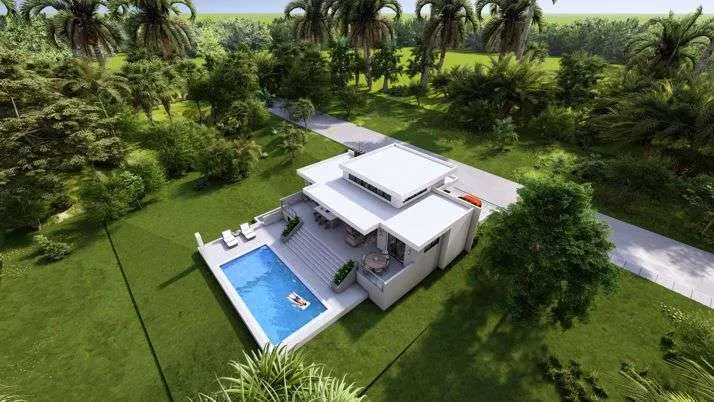buyDRproperty Modern luxury villa with swimming pool and lush tropical landscaping. Sosua Real Estate